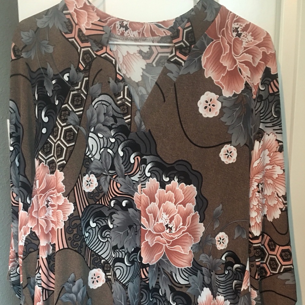 Style& Co. brand; V-neck medium top.